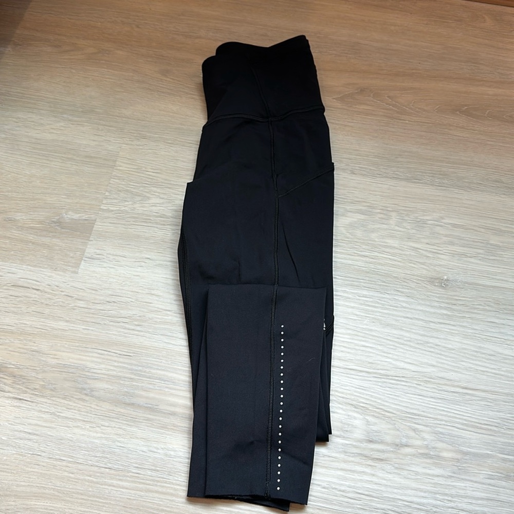 Lululemon leggings 7/8 length with Reflective detailing 
size 2
